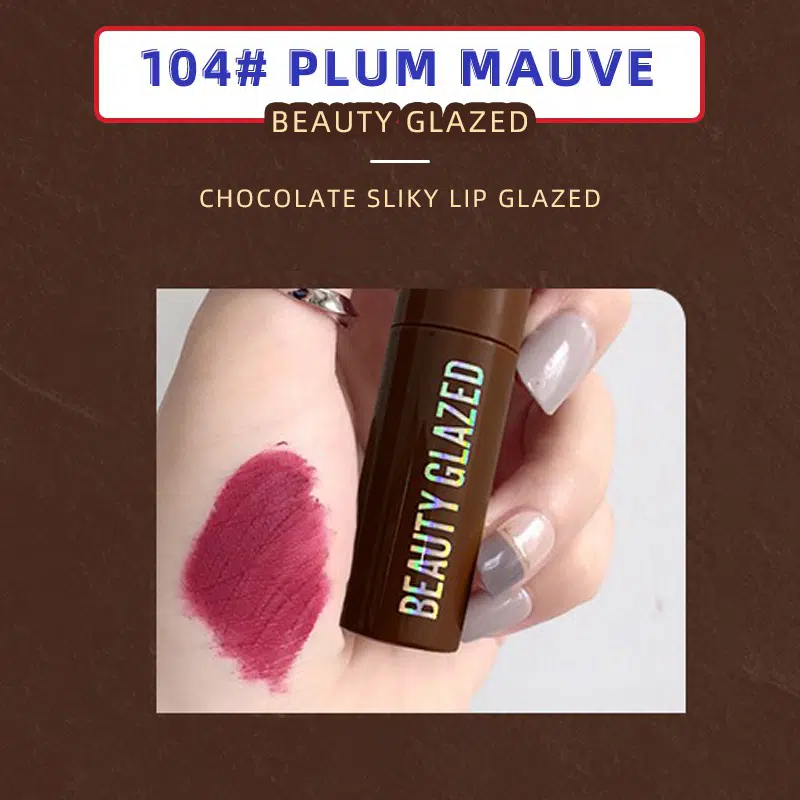 Beauty Glazed Chocolate Lipstick 104 Plum Mauve in unique dark, glossy chocolate-themed packaging, standing upright.