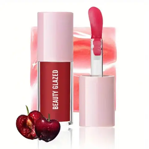 Beauty Glazed Moisturizing Lip Oil 102 in its clear tube, displaying a peachy-pink tint, standing upright.