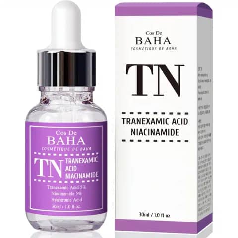 Cos De Baha Tranexamic Acid serum bottle with white dropper cap, clear liquid visible.