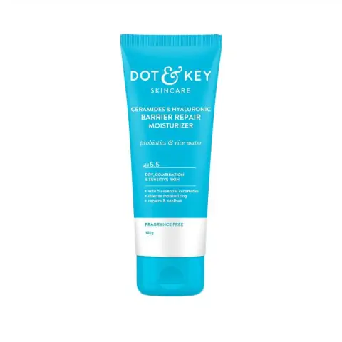 Dot & Key Ceramides Hyaluronic Barrier Repair Moisturizer in a white tub with purple lid, front view.