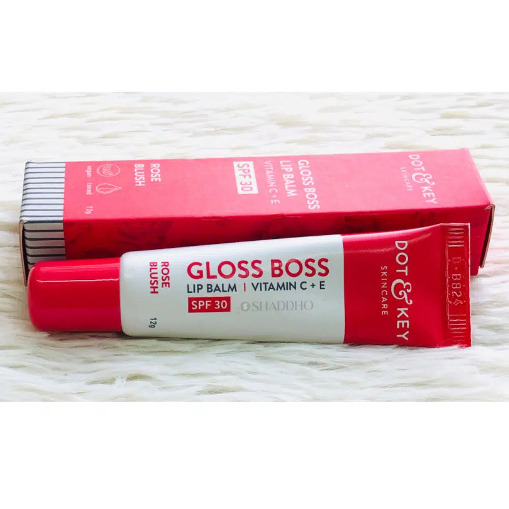 Dot & Key Gloss Boss Lip Balm in rose blush, tube with clear cap, standing upright.