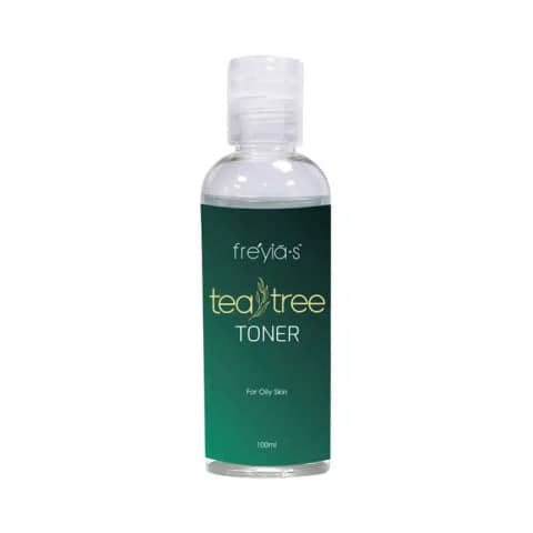 Freyias Tea Tree Toner 100ml clear bottle with green label and white pump cap, upright on white.