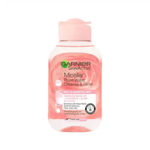 Garnier Micellar Rose Glow Cleansing Water 100ml in clear bottle with pink liquid, front view.