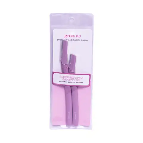 Groome eyebrow and facial razors in pink, blue, and yellow with clear plastic packaging.
