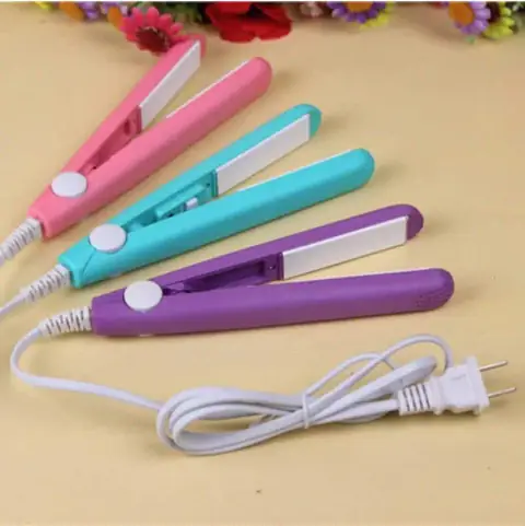 RuSu mini travel hair straightener in pink and white, showing closed ceramic plates for styling.