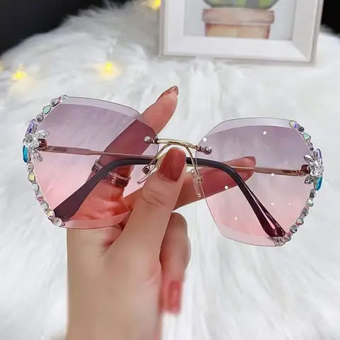 RuSu women's premium sunglasses with dark lenses, clear grey frames, and elegant stone embellishments.