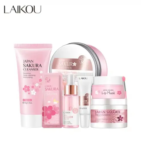 Laikou Sakura 7-piece skin care set featuring pink bottles with cherry blossom designs, neatly displayed.