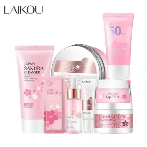 Complete Laikou Sakura 8-piece skincare set in elegant pink packaging, displayed with cherry blossoms.