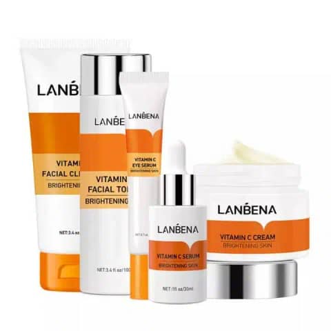 Lanbena Vitamin C skincare combo: five orange and white bottles and tubes, complete set arranged.