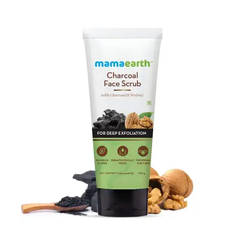 Mamaearth Charcoal Face Scrub 100ml in a sleek black pump bottle on a clean white background.