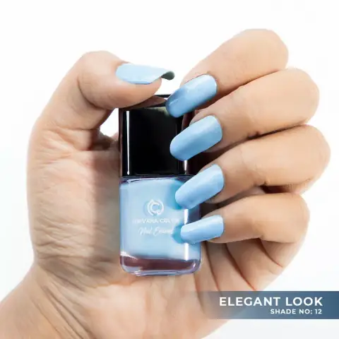 Nirvana Color Nail Enamel Elegant Look 12, a shimmering rose-gold polish bottle standing upright.
