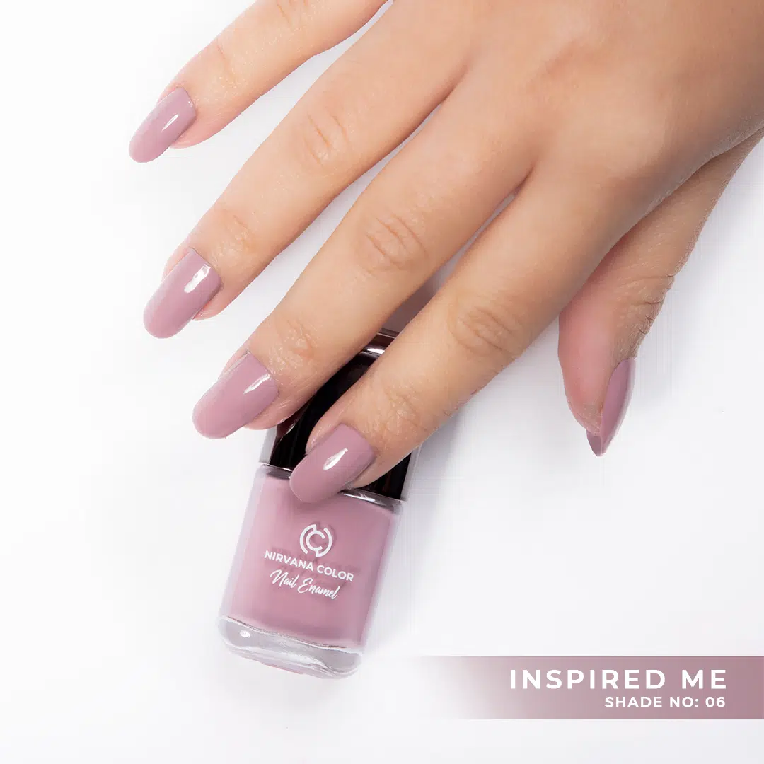 Nirvana Color Nail Enamel 'Inspired Me 06' bottle, rich shimmery magenta shade, elegant packaging.
