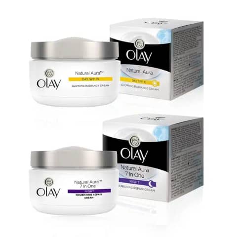 Olay Natural Aura Day Cream SPF 15 and Night Cream set, white and golden jars.