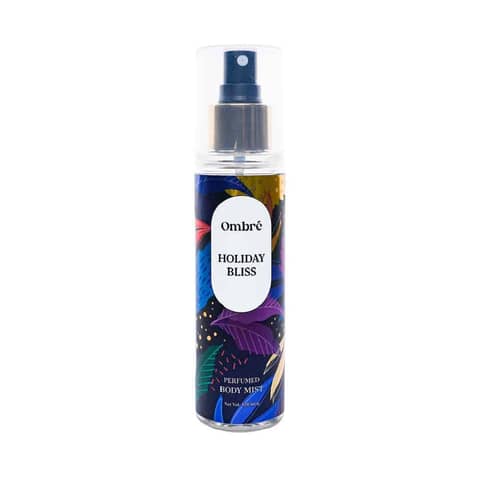 Ombre Holiday Bliss Perfumed Body Mist bottle, vibrant pink ombre label, clear with gold cap.
