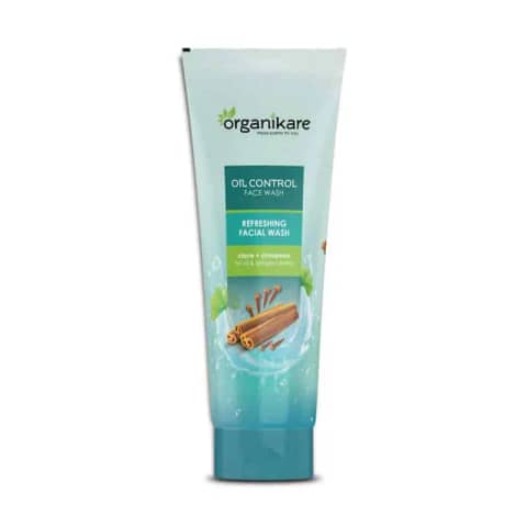 Organikare Oil Control Facewash, a vibrant green tube with white flip-top cap, angled slightly.