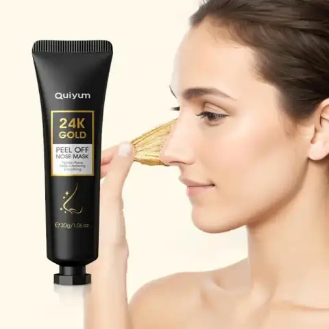 Quiyum 24k Gold Peel-off Nose Mask in a sleek, shiny gold tube with black text.