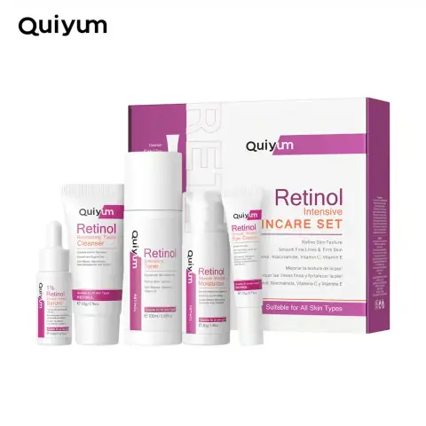 Quiyum Retinol 5-piece intensive skincare set with elegant white and gold packaging.