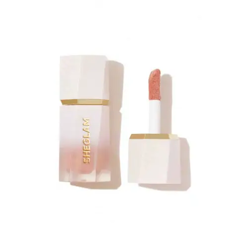 Sheglam Liquid Highlighter in Bellini Brunch shade, sleek tube packaging with silver cap.