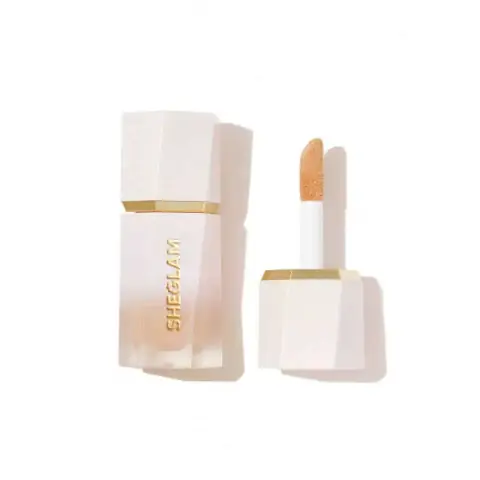 Sheglam Liquid Highlighter 'Tea Cake' in clear glass bottle with white dropper, front view.