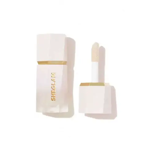 Sheglam Liquid Highlighter in Vanilla Frost, a clear bottle with an elegant rose gold cap.