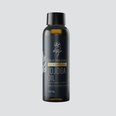 Skin Cafe 100% natural Jojoba Oil, clear glass bottle with white dropper cap, front view.