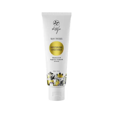 Skin Cafe Silky Tresses Moisturizing Conditioner 120ml in a white bottle with pump and vibrant floral label.