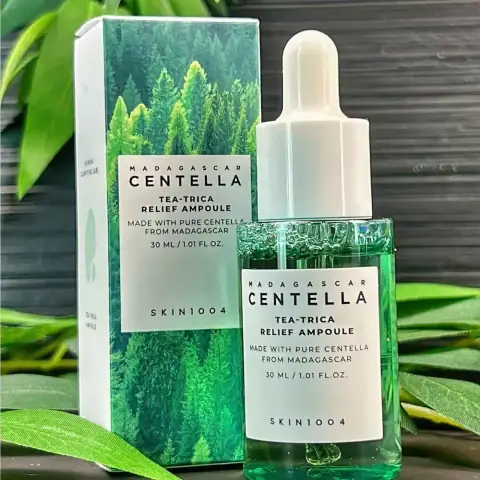 Premium SKIN1004 Madagascar Centella Tea-Trica Relief Ampoule, clear bottle with dropper and serum.