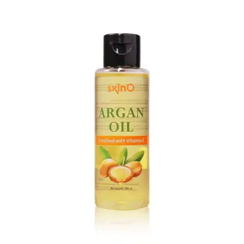 Full SkinO Argan Oil 100ml bottle, amber glass with golden pump, front-facing on light background.