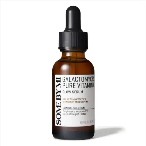 Clear glass SOME BY MI Galactomyces Pure Vitamin C Glow Serum bottle with amber liquid.
