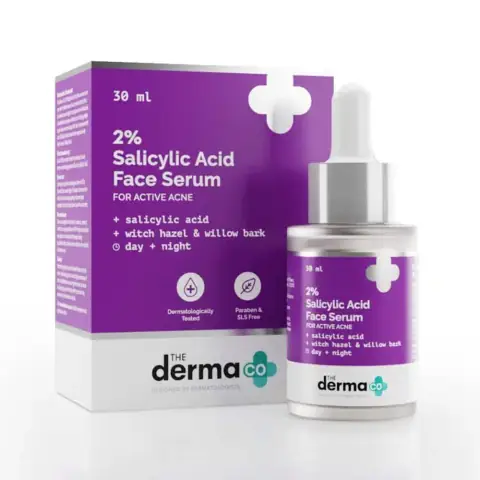 The Derma Co 2% Salicylic Acid Face Serum white box and clear glass dropper bottle.