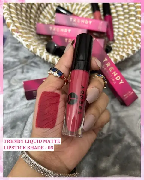Trendy Beauties Liquid Matte Lipstick 05 in deep burgundy shade, with elegant black and gold packaging.