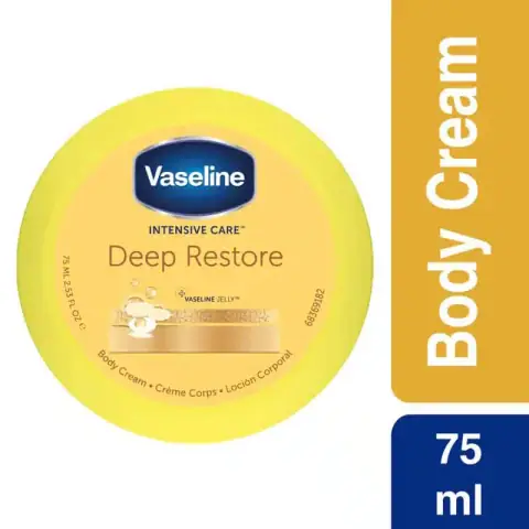 Front view of Vaseline Intensive Care Deep Restore Body Cream 75ml tube, blue cap, white body.