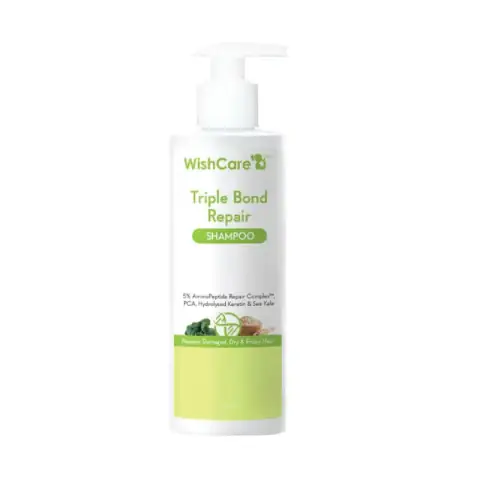 Front view of WishCare Triple Bond Repair Shampoo 250ml in a white pump bottle.