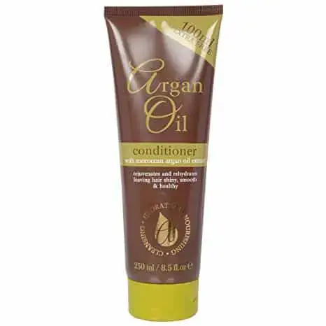 Front view of XPEL Argan Oil Conditioner's sleek dark brown pump bottle for dry, frizzy hair.