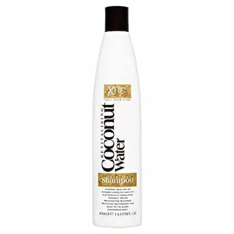 XPEL Revitalising Coconut Water Shampoo in white pump bottle with green coconut label, front view.
