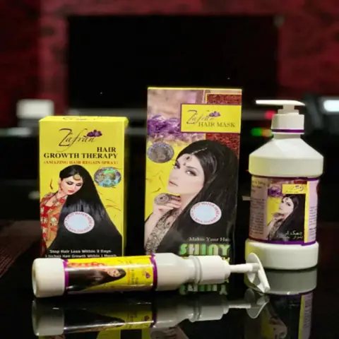Zafran Hair Loss Combo featuring Zafran Hair Oil bottle and Zafran Hair Mask jar, clean product shot.